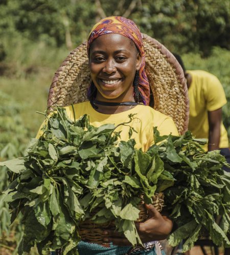 countryside-woman-holding-plant-leaves